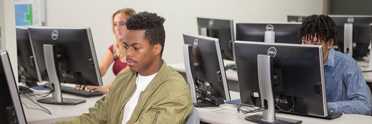 MCC students on computers