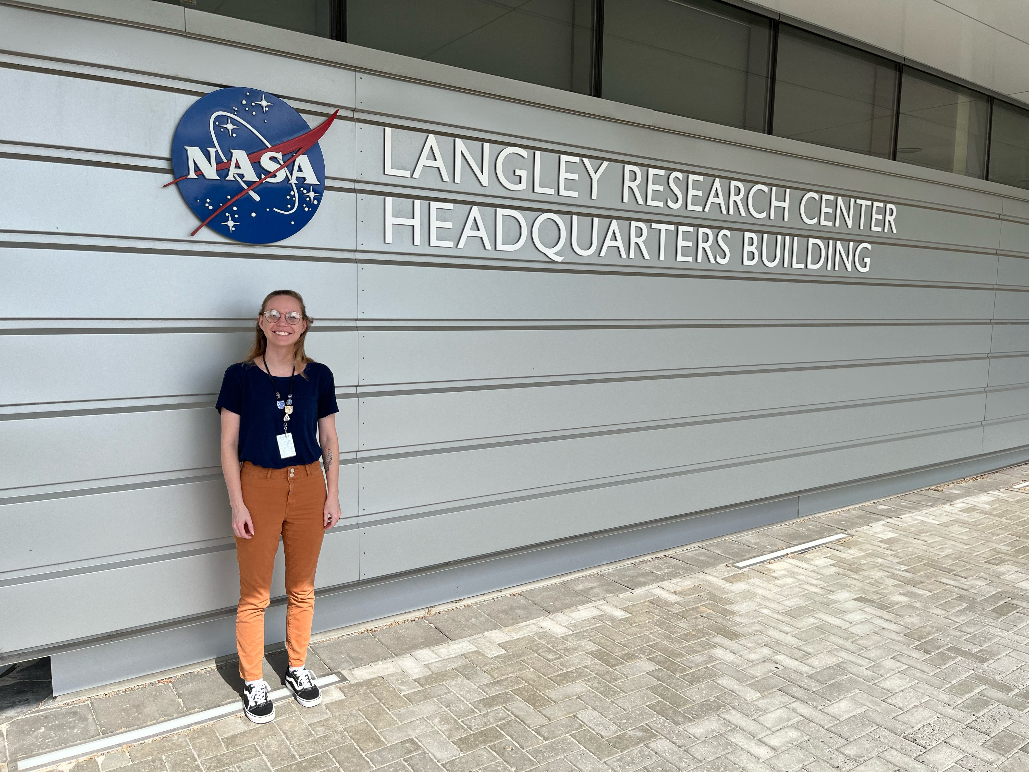 NASA_edit-(1).jpg Claire Pape standing in front of NASA Langley research center