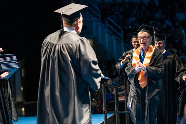 Beth Ragland receives associate degree diploma.