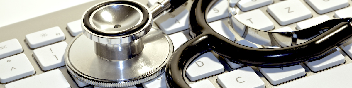 Healthcare tech keyboard and stethoscope