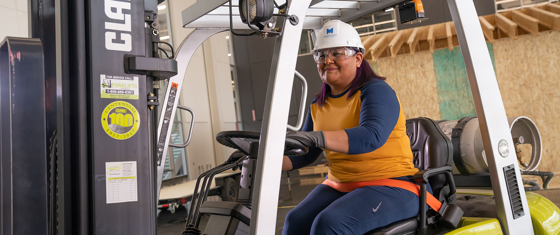 Women operating forklift