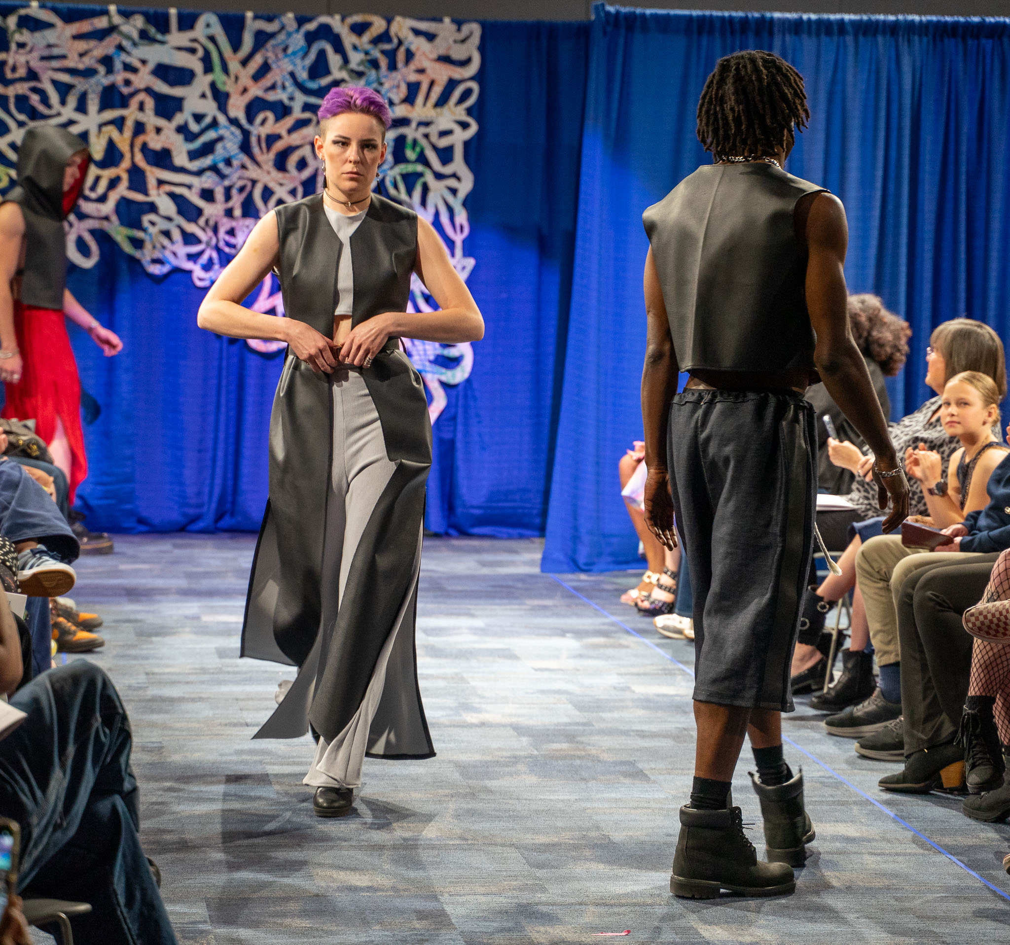 Group of student model on runway
