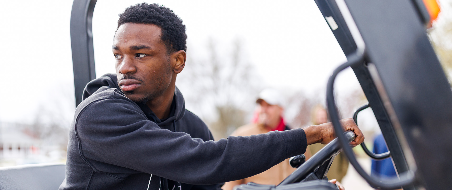 180 RAP participant backing up a forklift during training