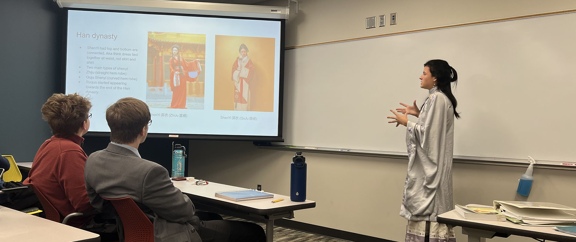 Women presenting in front of classroom