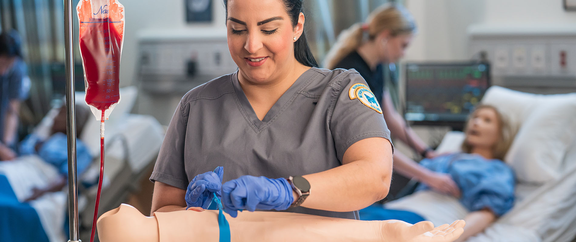 Phlebotomy tech drawing blood